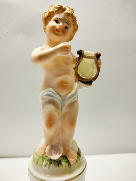 Figura- stara cieniutka porcelana Putto z harfą- sygnowana