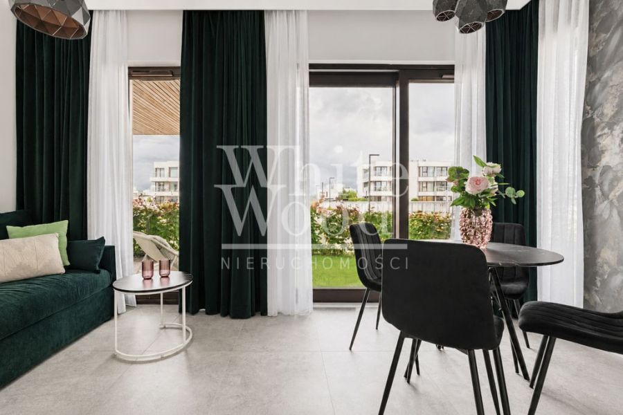 Nadmorski apartament z ogródkiem przy marinie