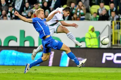 Paulus Arajuuri i Piotr Grzelczak 