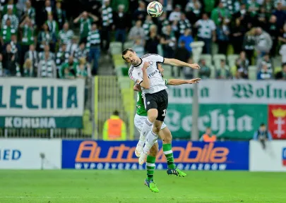 Michał Kucharczyk i Grzegorz Wojtkowiak 