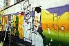 Kolorowe graffiti na szarych murach Wrzeszcza