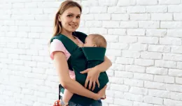 Chusta czy nosidełko - jak nosić niemowlaka?