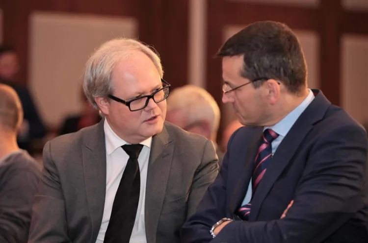Arkadiusz Siwko (z lewej) został nowym szefem Grupy Energa. Na zdjęciu z premierem Mateuszem Morawieckim.