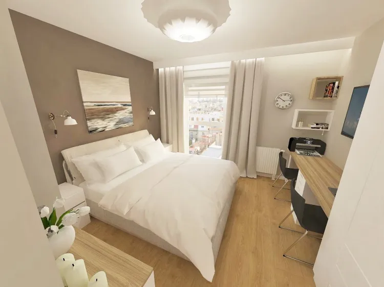 Przestrzeń do pracy wydzielona w sypialni to jedno z częściej wybieranych rozwiązań w kompaktowych mieszkaniach. 