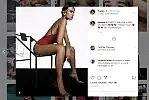 Dua Lipa w błyszczących, brokatowych szpilkach w srebrnym kolorze.