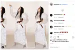 Modelka Bella Hadid w srebrnych, połyskujących szpilkach. 