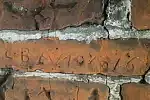 Zdjęcia napisów, które odkryto na murach Wielkiego Młyna.