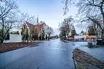 Skrzyżowanie Norblina - Abrahama oraz kościół pw. św. Stanisława Kostki