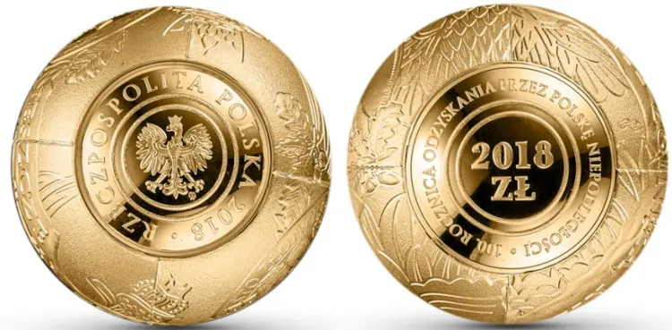 Złotówka z czystego złota w kształcie kuli wyemitowana w 2018 roku przez NBP z okazji stulecia odzyskania niepodległości.